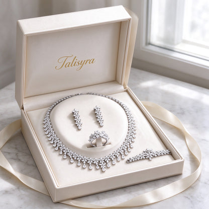 The Crest Bridal Set four-piece CZ parure presented in a Talisyra ivory satin-lined gift box