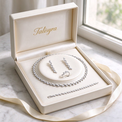 The Summit Wedding Suite laurel-vine CZ bridal set presented in a Talisyra ivory satin-lined gift box