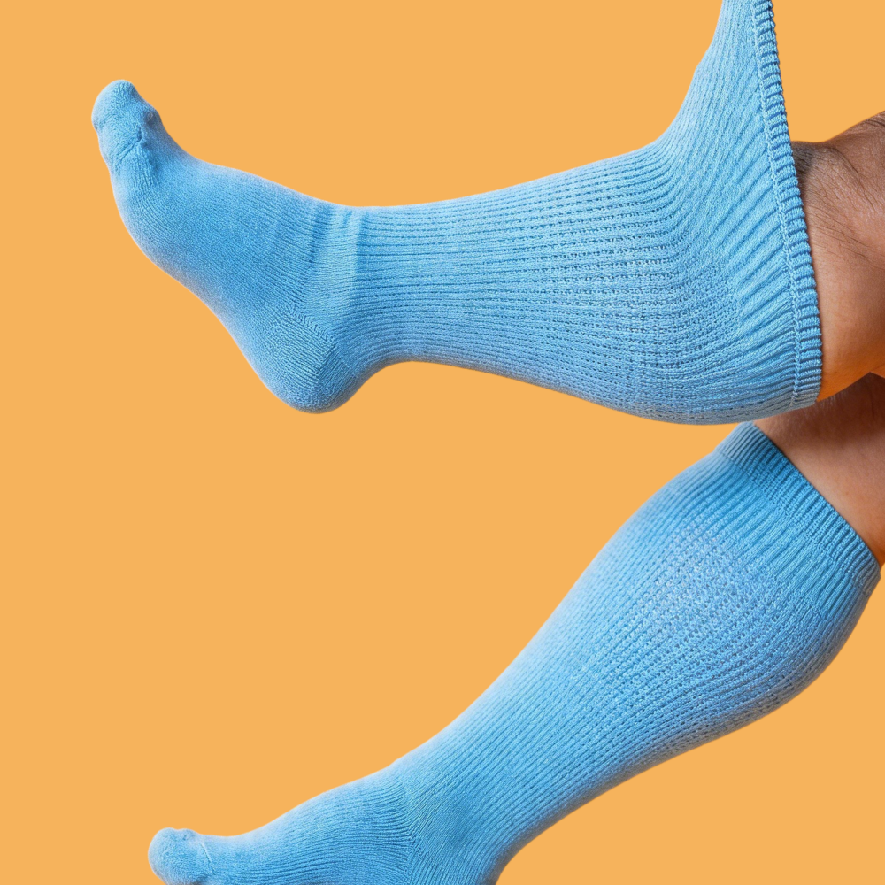 DiaFlow Neuropathy Relief Acupressure Socks in Light Blue – acupressure technology for foot nerve comfort and improved circulation.