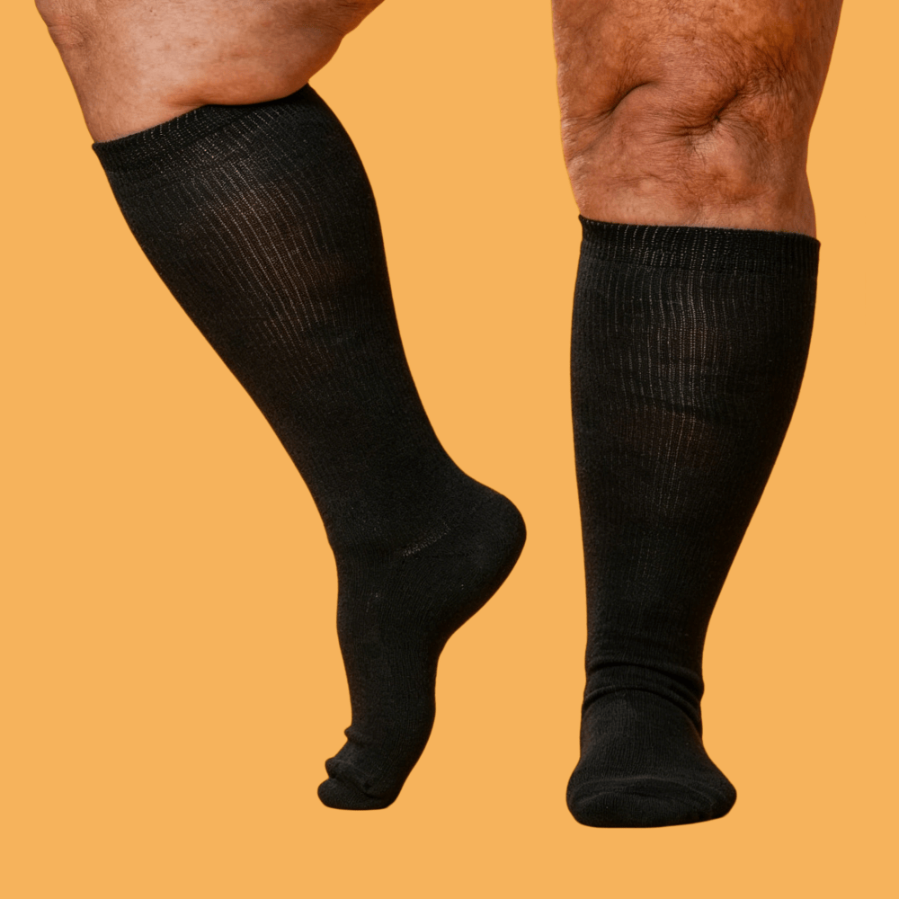 Black acupressure socks for diabetic neuropathy relief – soft, breathable, and medical-grade compression for daily wear.