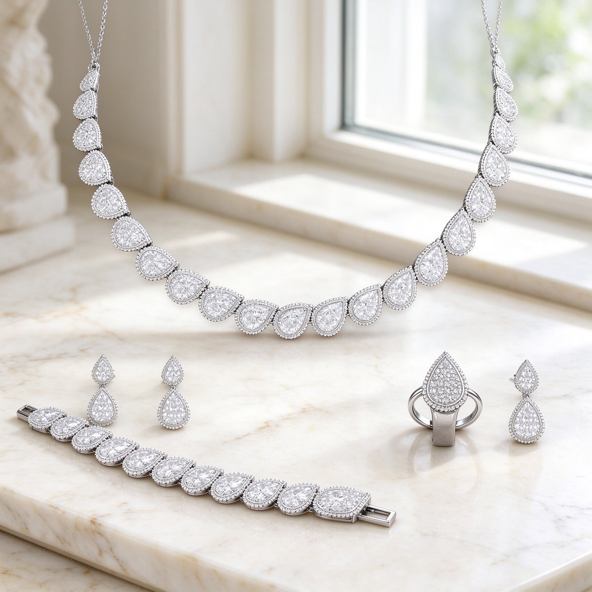 The Isadora Bridal Parure complete four-piece set flat lay