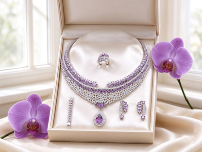 The Branch Bridal Set gift boxed in ivory Talisyra packaging with a purple orchid