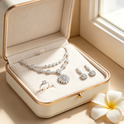 The Nadir Bridal Set presented in a cream and gold jewelry gift box