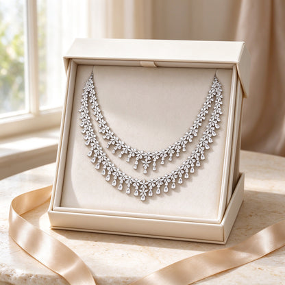 The Crest CZ bridal necklace presented in an ivory cream Talisyra gift box
