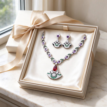 The Camellia Bridal Parure necklace and earrings presented inside an ivory satin-lined gift box with champagne ribbon