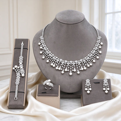 The Rue Bridal Parure silver-tone pearl and CZ fringe collar necklace on warm grey velvet bust