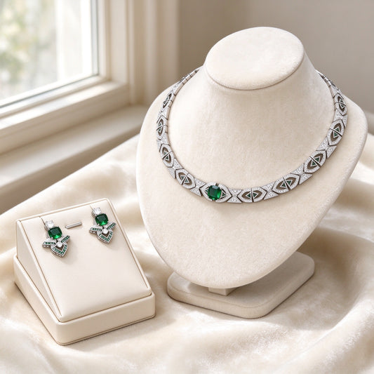 The Meteor Wedding Suite — Art Deco geometric choker necklace with emerald green CZ and matching earrings in ivory styling