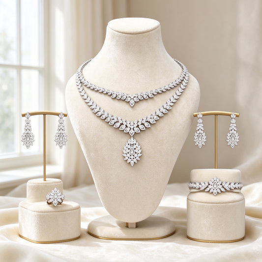 The Clementine Bridal Set — double-layer marquise CZ bridal jewelry on cream velvet bust
