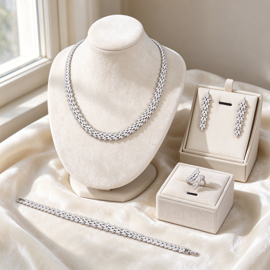 The Nova Bridal Set — marquise CZ leaf necklace, earrings, bracelet and ring in ivory styling