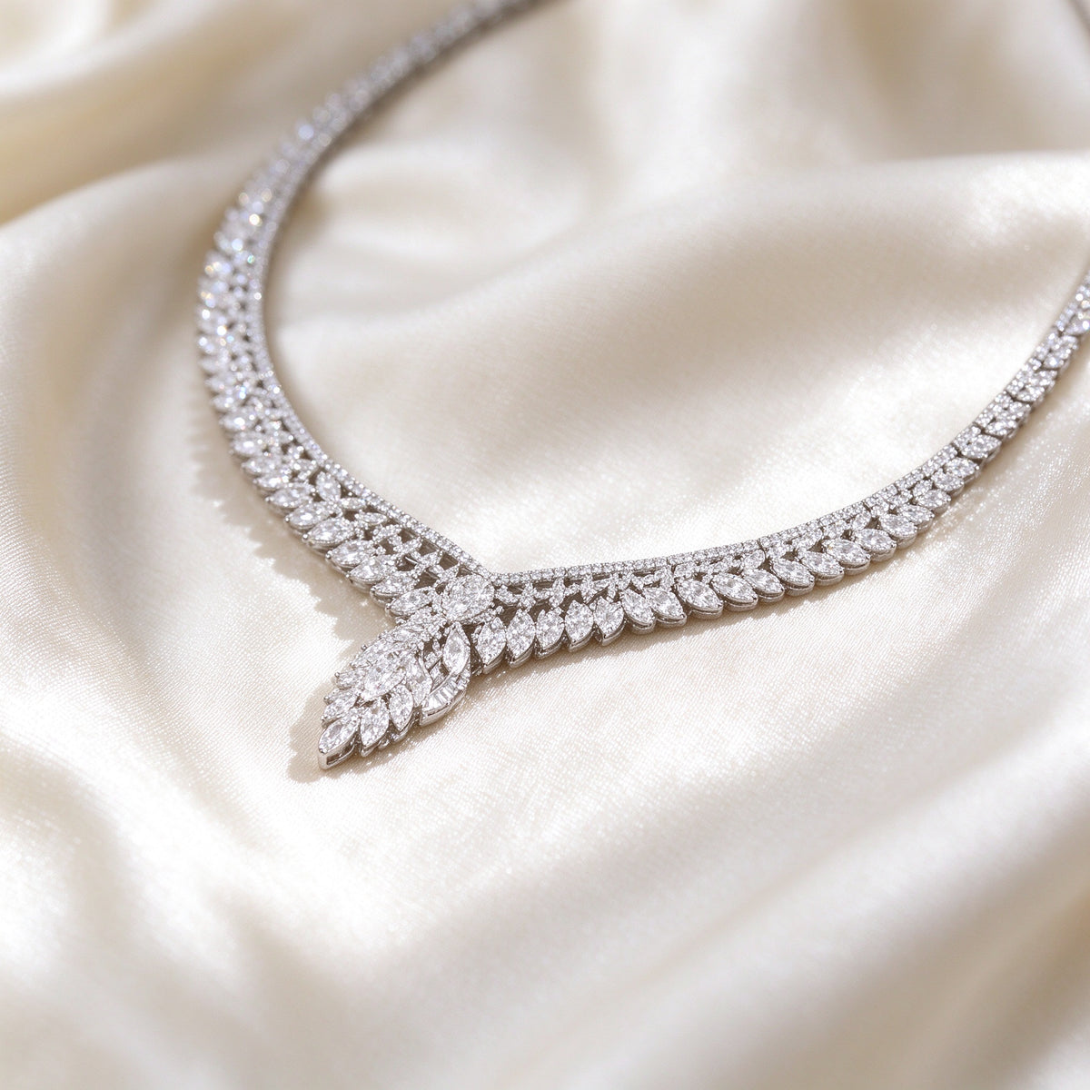 Macro detail of The Petal Bridal Set micro-pavé CZ leaf pattern