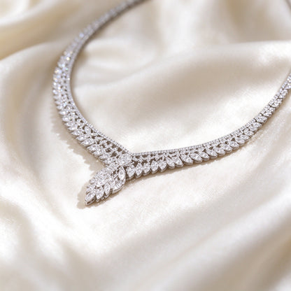 Macro detail of The Petal Bridal Set micro-pavé CZ leaf pattern