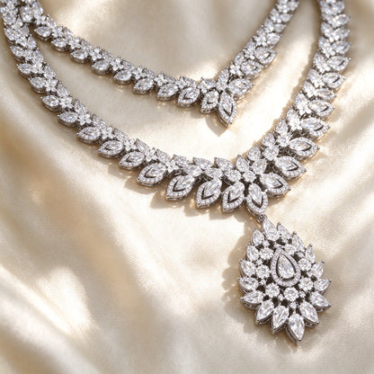 Macro detail of marquise-cut clear cubic zirconia stones on silk fabric