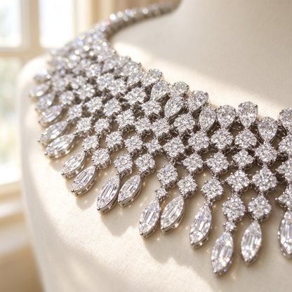 Macro detail of graduated marquise and round CZ floral clusters