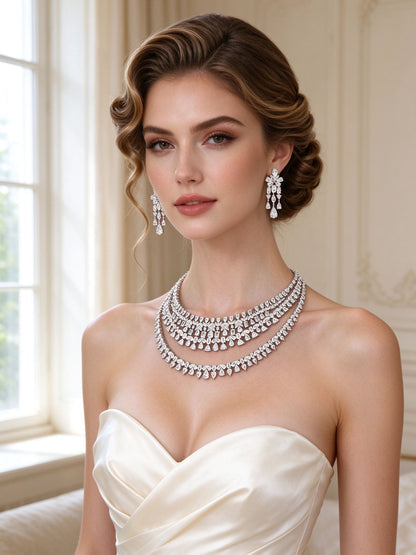 European bride wearing The Fjord Bridal Set mixed-cut CZ collar necklace and chandelier earrings