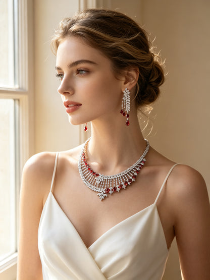 Bridal model wearing The Leaf Crystal Parure lattice necklace with red pear drops