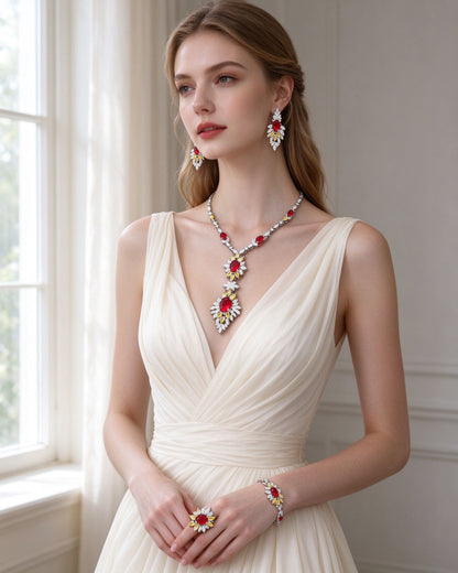 Bride in an ivory gown wearing The Seed Bridal Parure colorful floral four-piece set