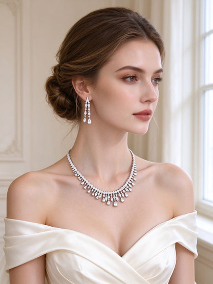 The Harper Crystal Parure – European bride wearing the all-clear crystal fringe collar necklace and linear drop earrings