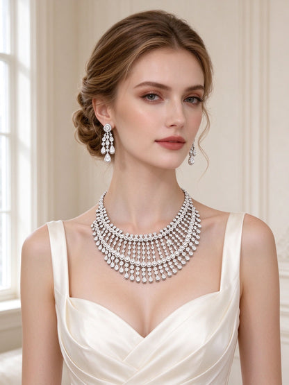 The Avery Wedding Suite – European bride wearing the layered fringe bib necklace and halo drop earrings