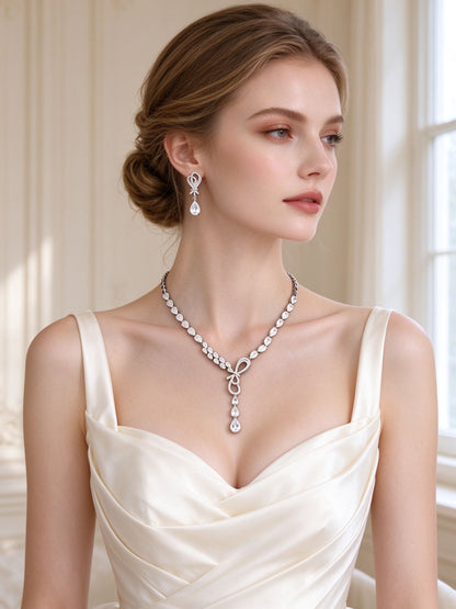 The Cameron Bridal Set – European bride wearing the silver ribbon cascade Y-necklace and drop earrings