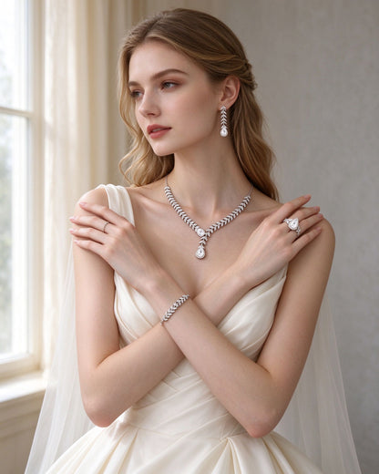 European bride wearing The Stem Crystal Parure full four-piece set in an ivory wedding gown