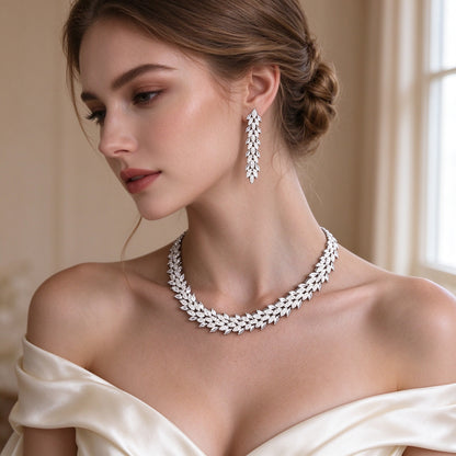 Close-up of The Nova Bridal Set marquise CZ necklace and earrings on bridal neckline