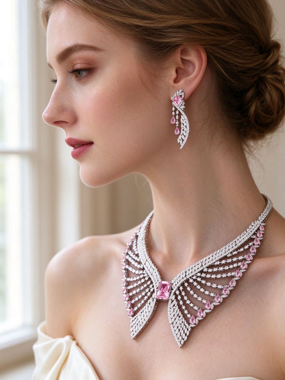 Side detail of The Reagan Bridal Set showing the wing drop earring and feathered rows at the collarbone