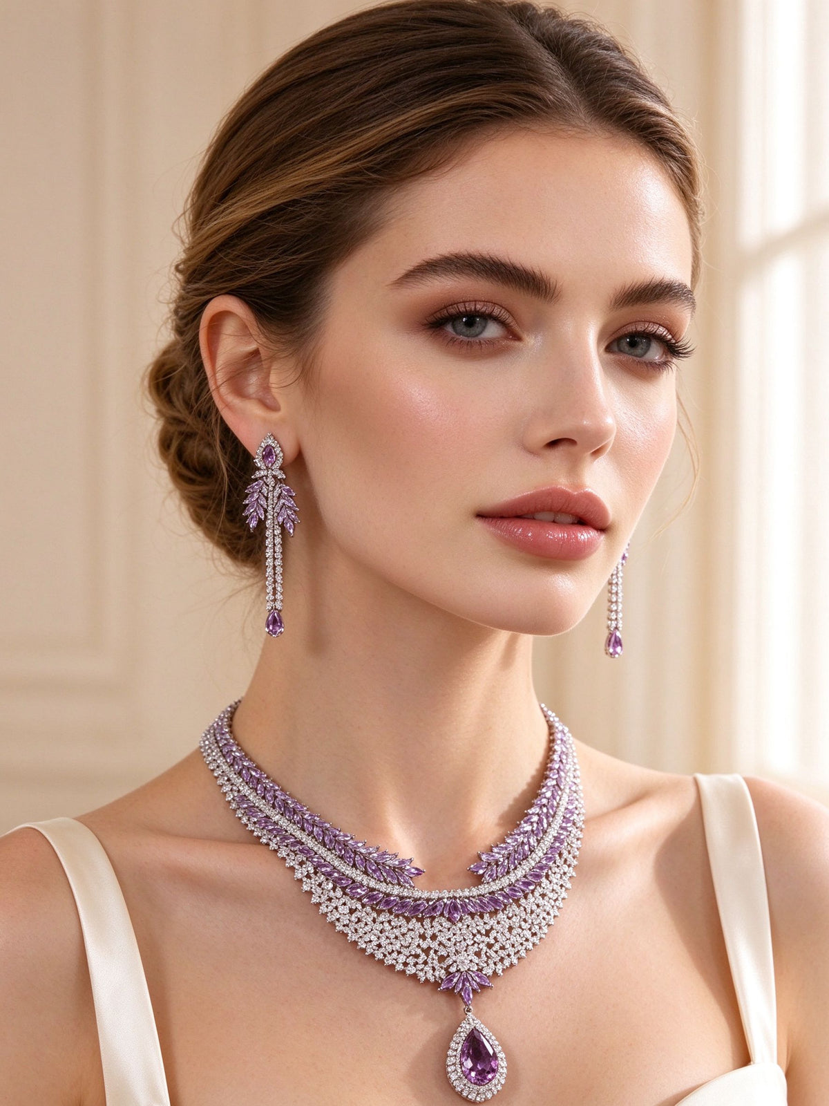 Close-up of a bride in The Branch amethyst drop earrings and collar necklace