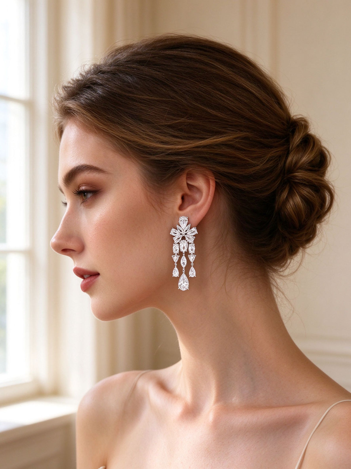Close-up of The Fjord Bridal Set tiered chandelier CZ drop earrings