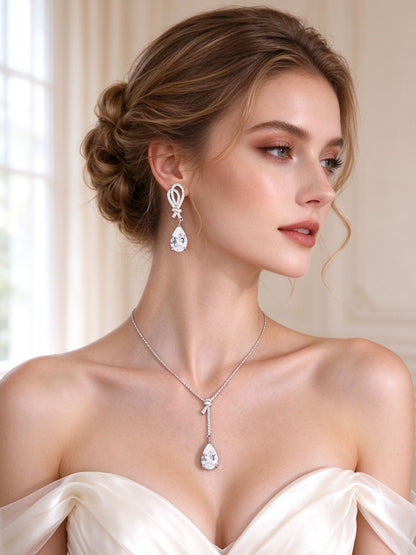 The Cameron Bridal Set – side close-up of the pavé ribbon-loop pear-drop earring at the jawline