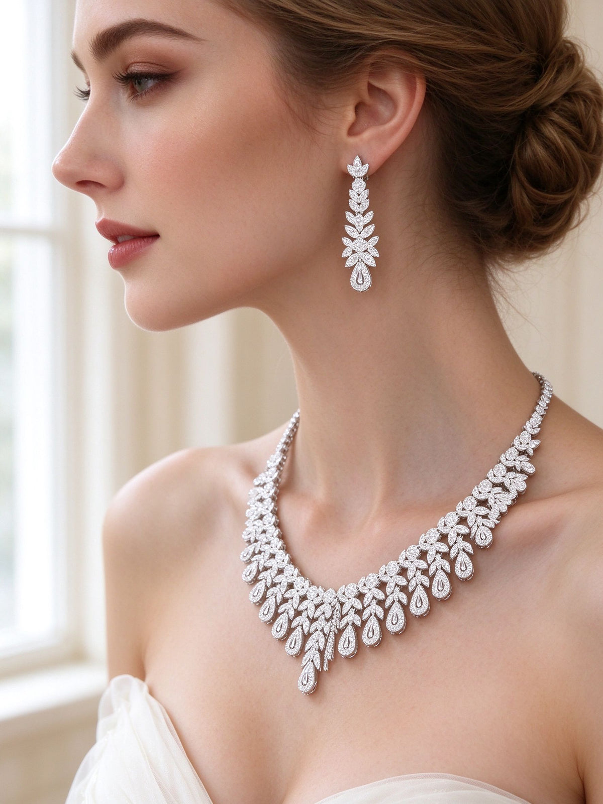 The Seraphine Bridal Set – side close-up of the silver-tone linear earrings and teardrop collar