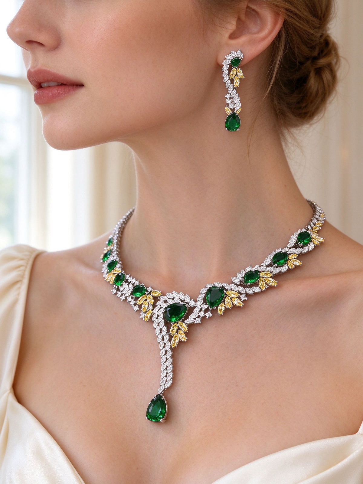Side detail of The Hadley Crystal Parure showing the linear earring and Y-drop pendant at the collarbone