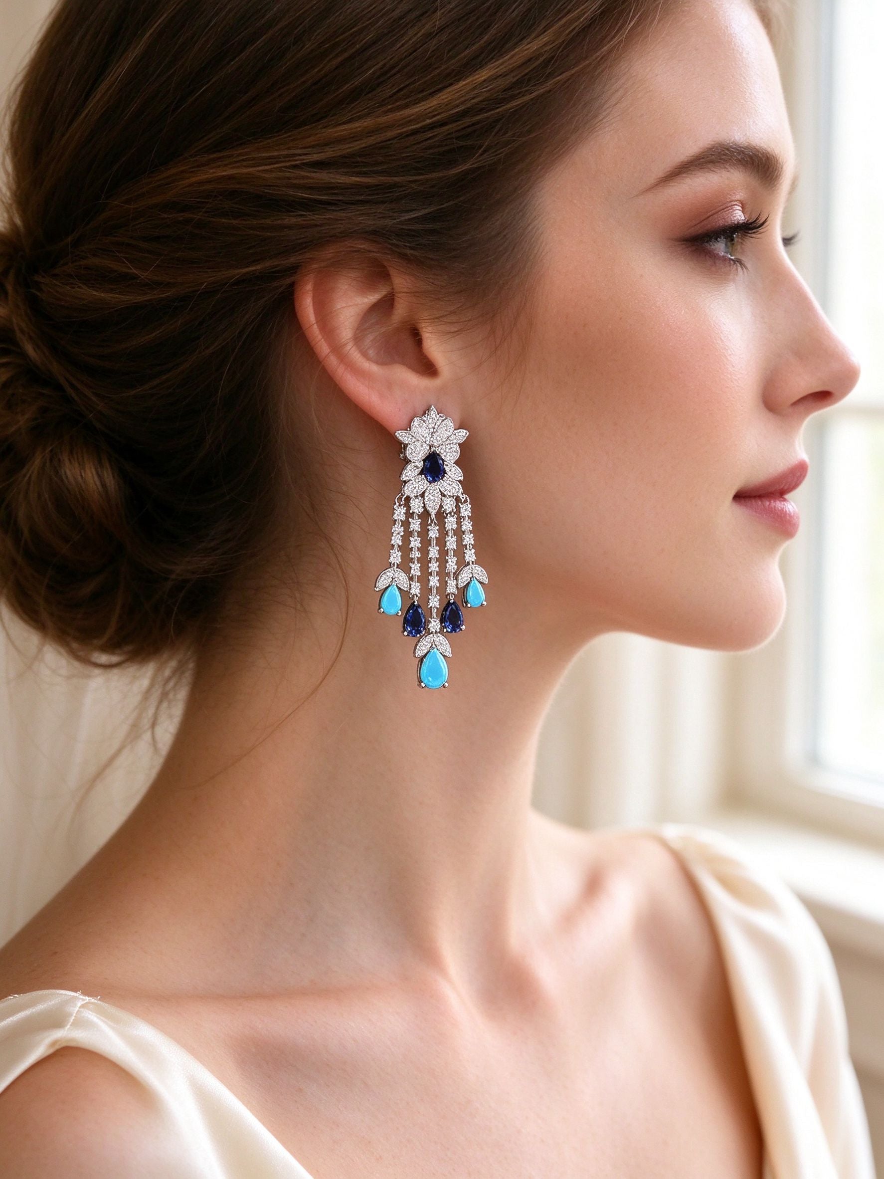 Side profile close-up of bride wearing The Celestine fringe tassel chandelier earring