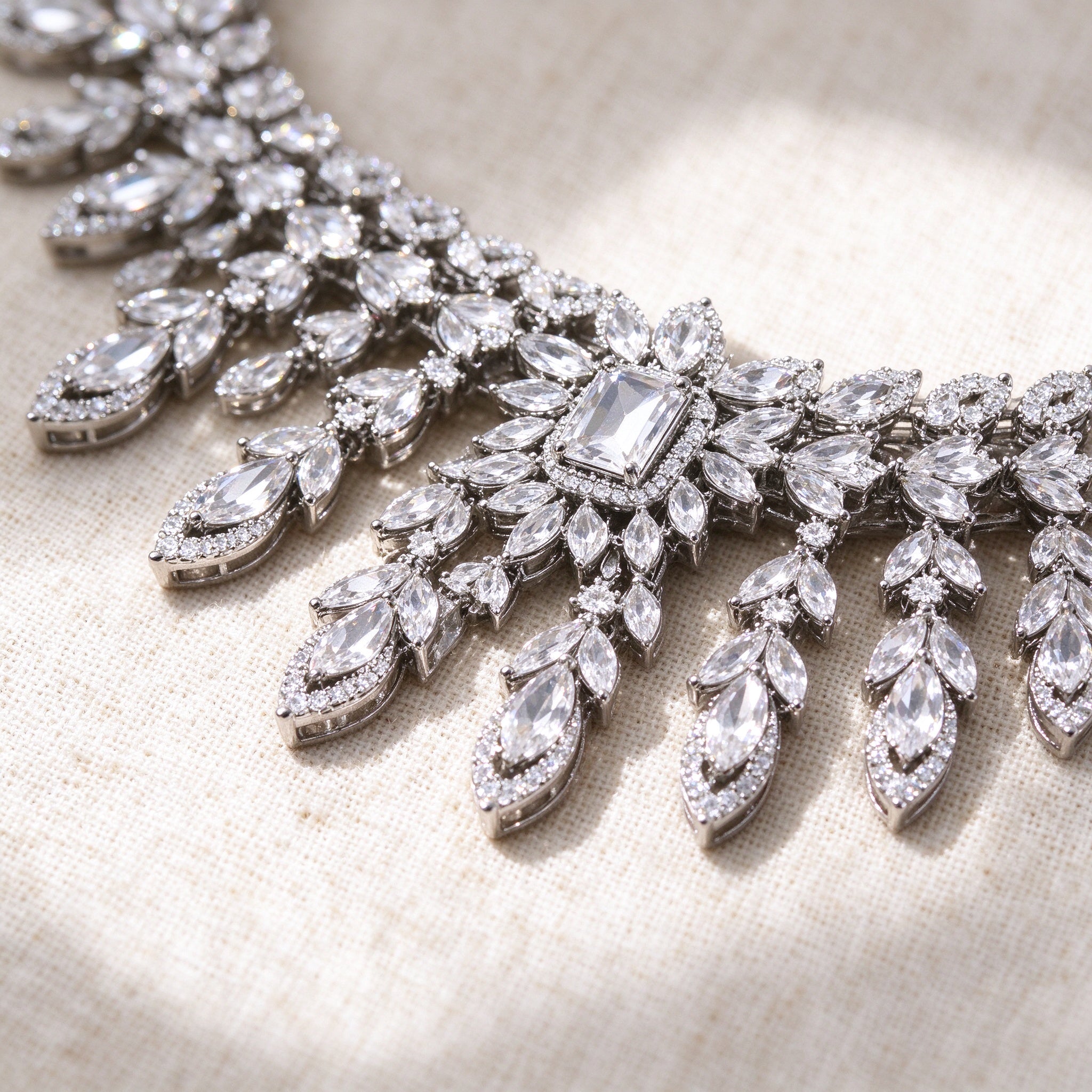 Macro of marquise and pear-cut cubic zirconia fringe detail