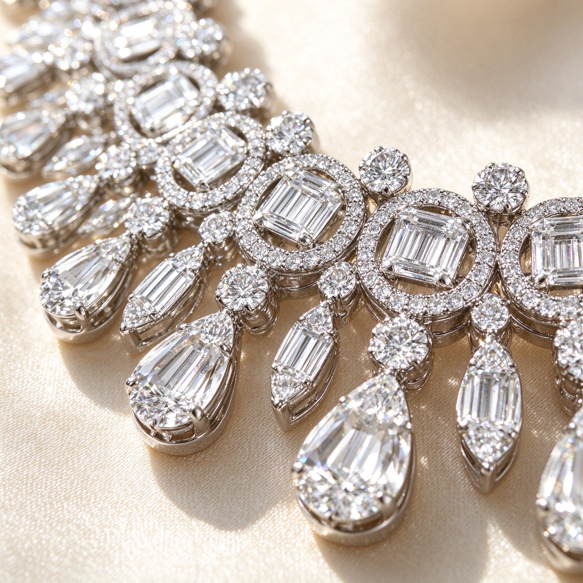 Macro detail of The Vine baguette and pear-cut cubic zirconia fringe